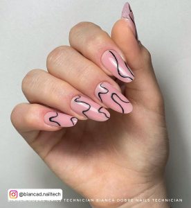 Nude And Black Nails With Swirls
