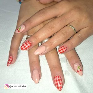 Nude Nails With Red And White Designs