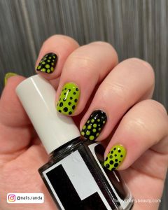 Olive Green And Black Nails With Dots