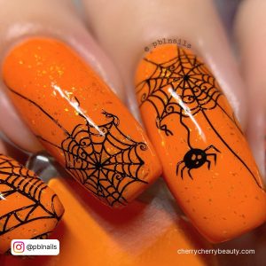 Orange And Black Halloween Nails With Webs And Spiders