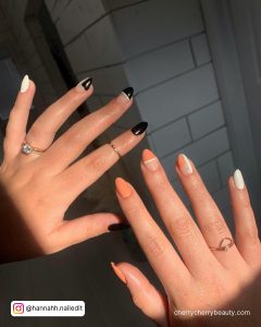 Orange And Black Nail Ideas With White Combination