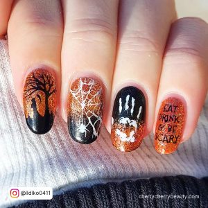 Orange And Black Ombre Nails With Webs On Almond Shape