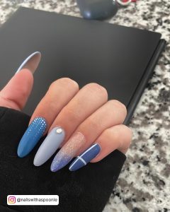 Pastel Blue Nails With Glitter