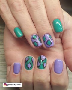 Pastel Green And Purple Nails