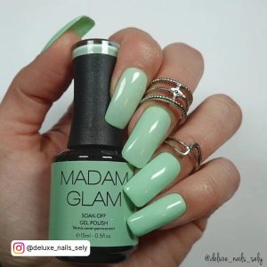 Pastel Green Nails With Flowers