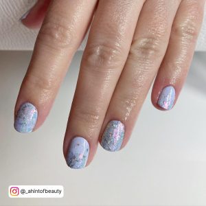 Pastel Pink Blue And Yellow Nails