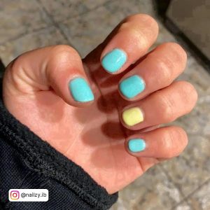 Pastel Yellow And Blue Nails