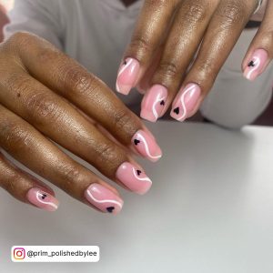 Pink Nails With Black Heart And White Swirls