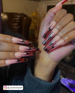 Red And Black Flame Nails With Nude Base Coat