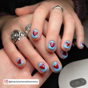 Red And Blue Nail Art With Hearts