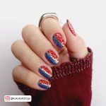 Red And Blue Nails With Golden Design