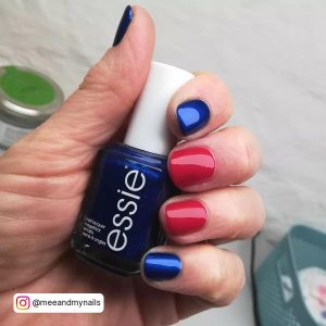 Red And Navy Blue Nails With A Glossy Finish