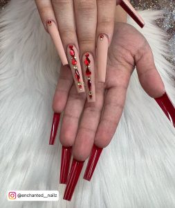 Red French Tip Nails With Diamonds