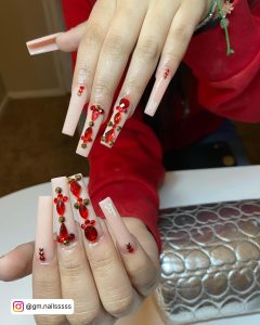 Red French Tip Nails With Rhinestones