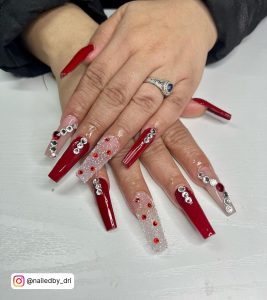 Red Nail Art With Diamonds