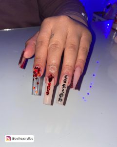 Red Nail Design With Rhinestones