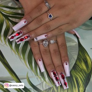 Red Nails With Gold Rhinestones