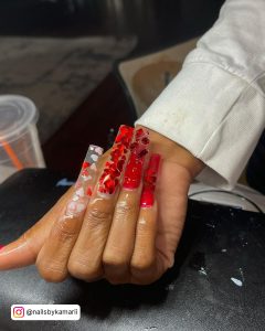 Red Nails With White Hearts