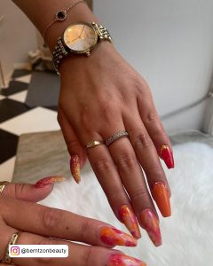 Red Orange Nails With Design