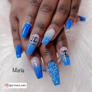 Royal Blue And White Nails With Diamonds