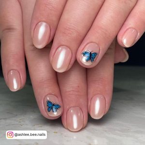 Royal Blue Nails With Butterflies