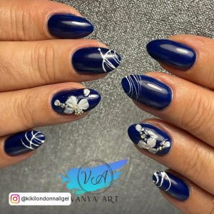 Short Dark Blue Nails With White Design