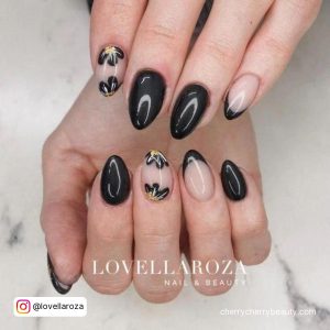Simple Black Flower Nail Art In Almond Shape