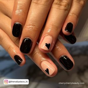 Simple Black Nail Art With Hearts On Ring Finger