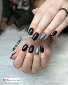 Simple Black Nail Designs With Glitter On Ring Finger