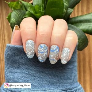 Sky Blue And White Nails With Abstract Design