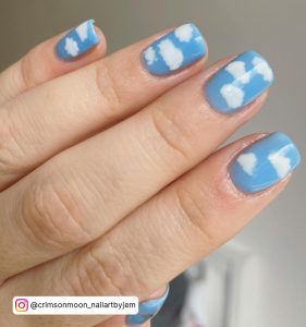 Sky Blue Color Nails With White Clouds