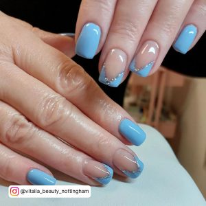 Sky Blue French Tip Nails With Diamonds