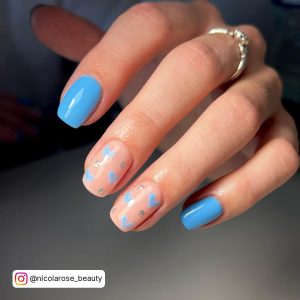 Sky Blue Nail Art Design With Hearts