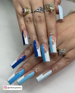 Sky Blue Nails With White And Navy Blue Combination