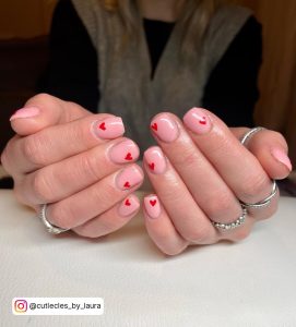 White Acrylic Nails With Red Hearts