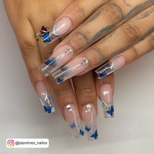 White Nails With Blue Butterflies