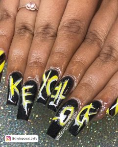 Yellow And Black Nail Art Designs With Alphabets