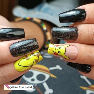 Yellow And Black Nail Art With Pikachu And Glitter