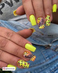 Yellow And Black Nail Design With Cheetah Print