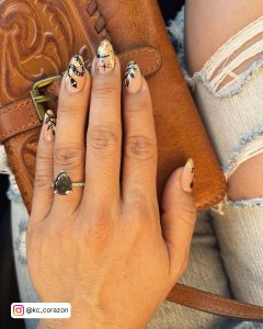 Yellow Black And White Nail Designs With Snake And Leaves