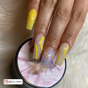 Yellow French Tip Coffin Nails