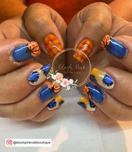 Baby Blue Orange Nails