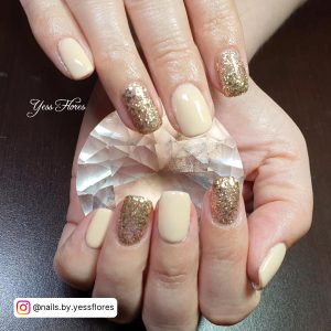 Black And Gold Glitter Nail Designs