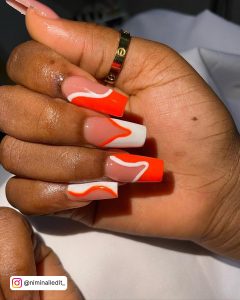 Black And Orange Acrylic Nails