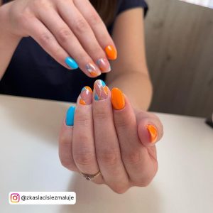 Blue And Orange Heart Nail Designs