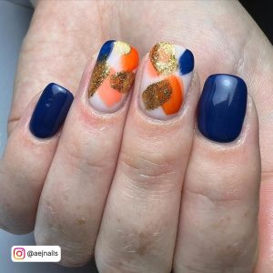Blue And Orange Marble Nails