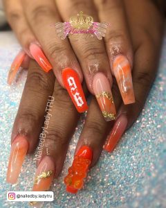 Bright Orange Acrylic Nails