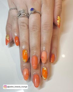 Bright Orange And Black Nails