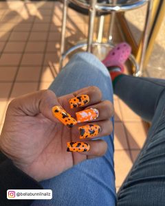 Bright Orange And White Nails