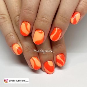 Bright Orange Nails With Design